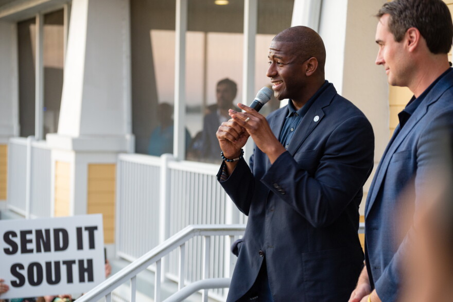 Tallahassee Mayor Andrew Gillum and his running mate Chris King address the crowd outside of Riverside Community Center in Fort Myers on Oct. 30.