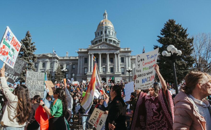 Protesters gather at the Colorado Capitol on Wednesday, Feb. 5, 2025, to speak out against the Trump administration.