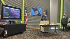 Alaska Wildlife Trooper Josh Boyle at a May 14, 2022 media briefing on the disappearance of 7-year-old Sawyer Cipolla. Searchers canvassed more than 10,000 acres of Kodiak Island looking for the boy. (Kirsten Dobroth, KMXT)