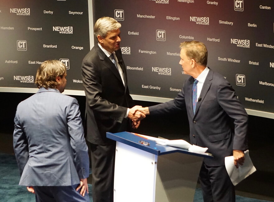 Bob Stefanowski, Ned Lamont shake hands at 2018 debate. Only one of them, Lamont, is a declared candidate, but the 2022 race seems under way.