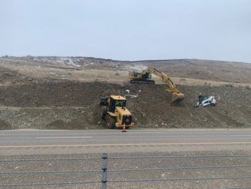 Crews work to stabilize movement of a landslide near I-84 milepost 359 near Ontario, Ore., March 31, 2023.