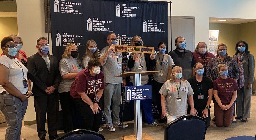 Staff of Positive Health Solutions at a press conference at UI-COMP announcing their LGBTQ+ primary care clinic