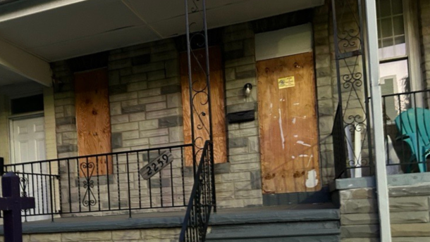 A boarded up rental rowhome in South Baltimore.