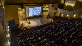 A faculty lecture at University of Washington, one of many in-state colleges the savings plans aims to help kids attend.