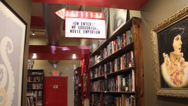 A sign pointing the way to Mr. Googoriums Movie Emporium at Bookmarx in Springfield, Mo. on March 23, 2026.