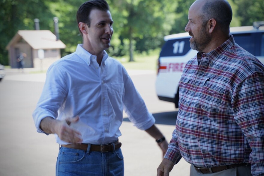 The Republican Chairman of the Darlington Township's Board of Supervisors, Mike Carreon, speaks with Democratic Rep. Chris Deluzio at event in Darlington announcing federal funding for the township.