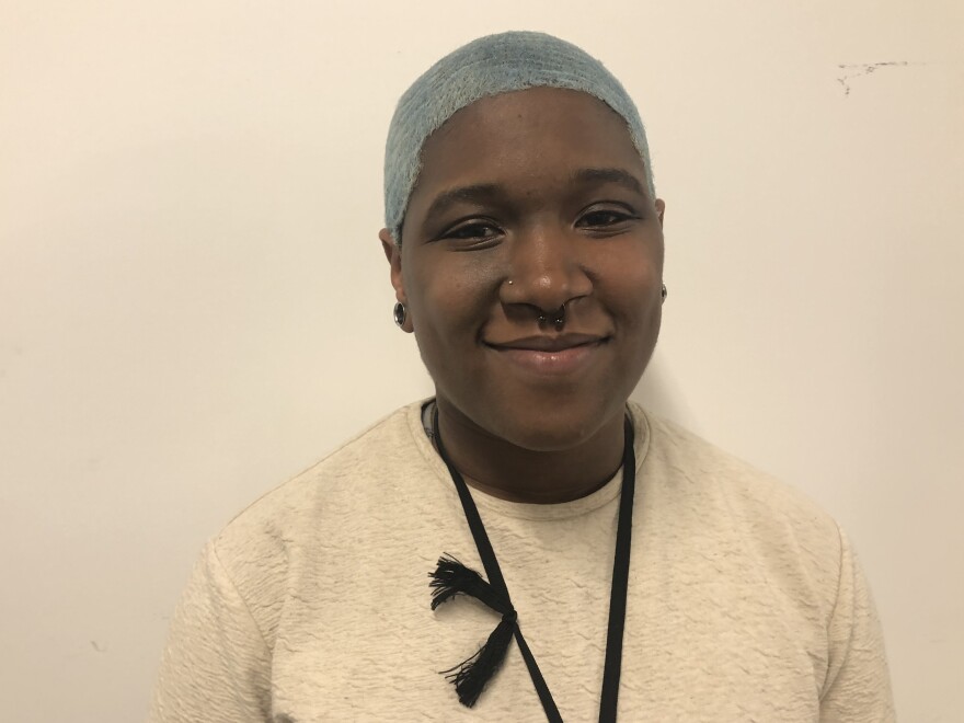 Ivy Strickland studies coding at Pursuit, which trains low-income adults for tech jobs.