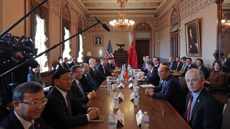Navarro, Commerce Secretary Wilbur Ross, U.S. Trade Representative Robert Lighthizer, Treasury Secretary Steven Mnuchin and other Trump administration officials sit down with Chinese senior officials for trade negotiations at the Eisenhower Executive Office Building on Jan. 30, 2019.