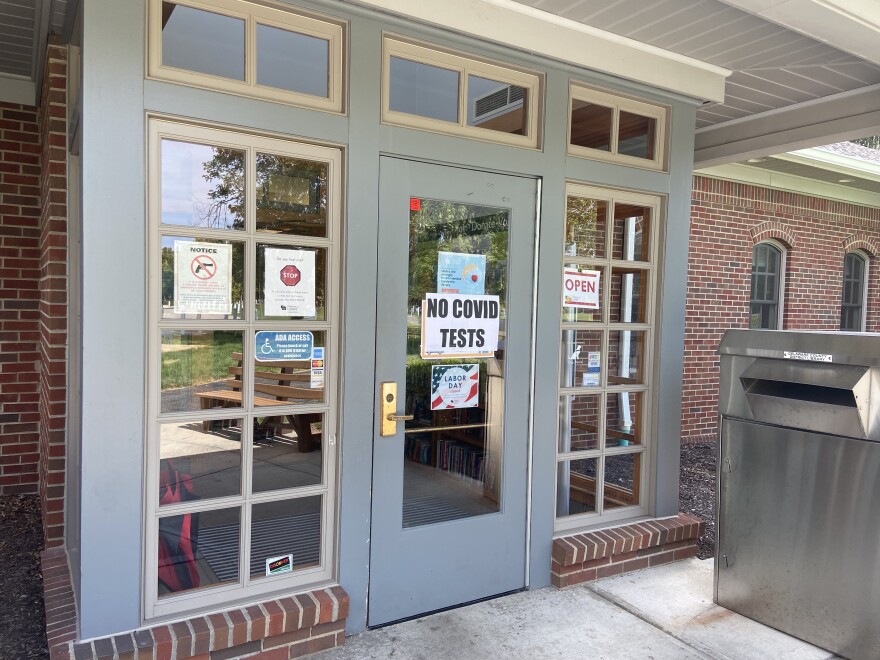 No COVID test sign on library door at library in Powell