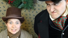 Lucene Drissell (left) as Bob Cratchit and Alex Smith as Scrooge