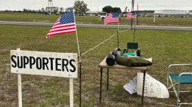 Protesters and counter-protesters ahead of the execution of Norman Grim on October 28.