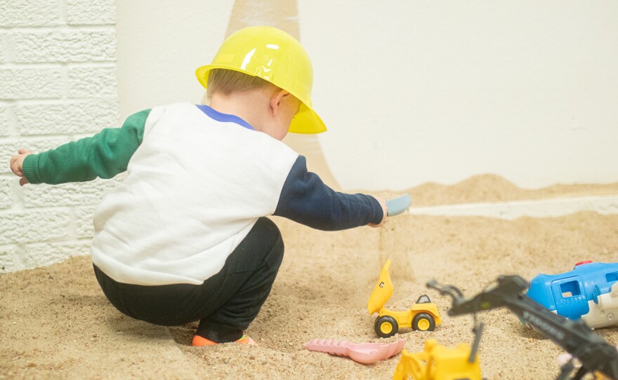 Benjamin Miller drops a scoop of sand in the sand-box on Feb. 26. Play & Party Co. is open from 10 a.m. to 6 p.m. Monday through Friday, and 10 a.m. to 4 p.m. on Saturdays.