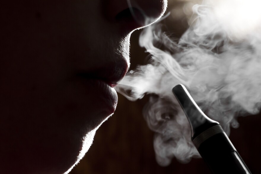 E-cigarettes work by heating up a fluid that contains the drug nicotine, producing a vapor that users inhale. The devices are most popular among young adults, ages 18 to 24, a federal survey indicates.