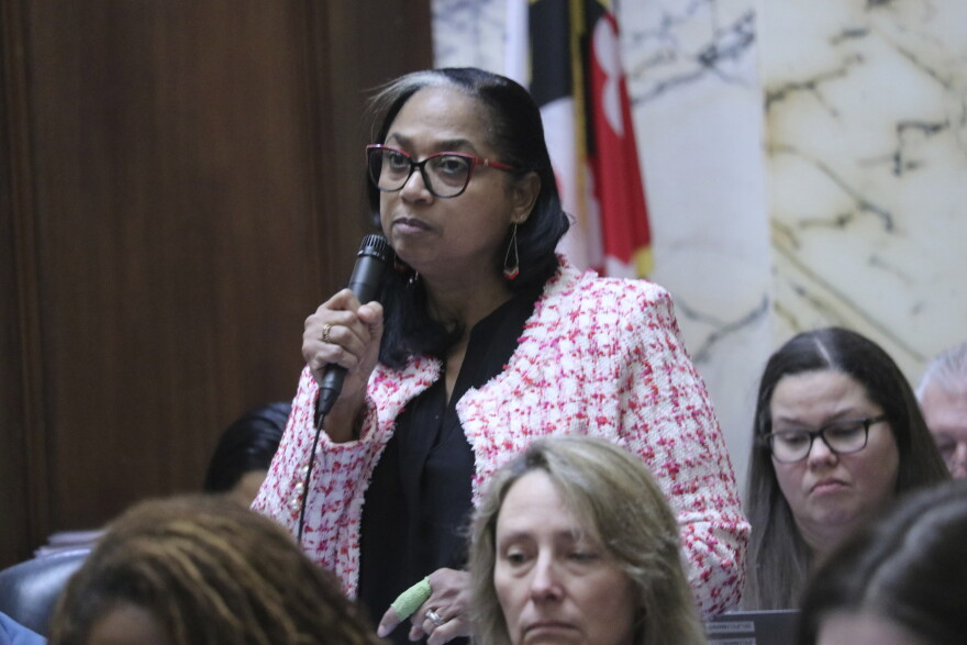 Maryland Del. Joseline Pena-Melnyk, a Democrat who chairs the Maryland House Health and Government Operations Committee, speaks in favor of a bill to enable people to buy health insurance through the state's health care exchange regardless of their immigration status, with approval of a federal waiver during debate on Friday, Feb. 23, 2024, in Annapolis, Md. (AP Photo/Brian Witte)