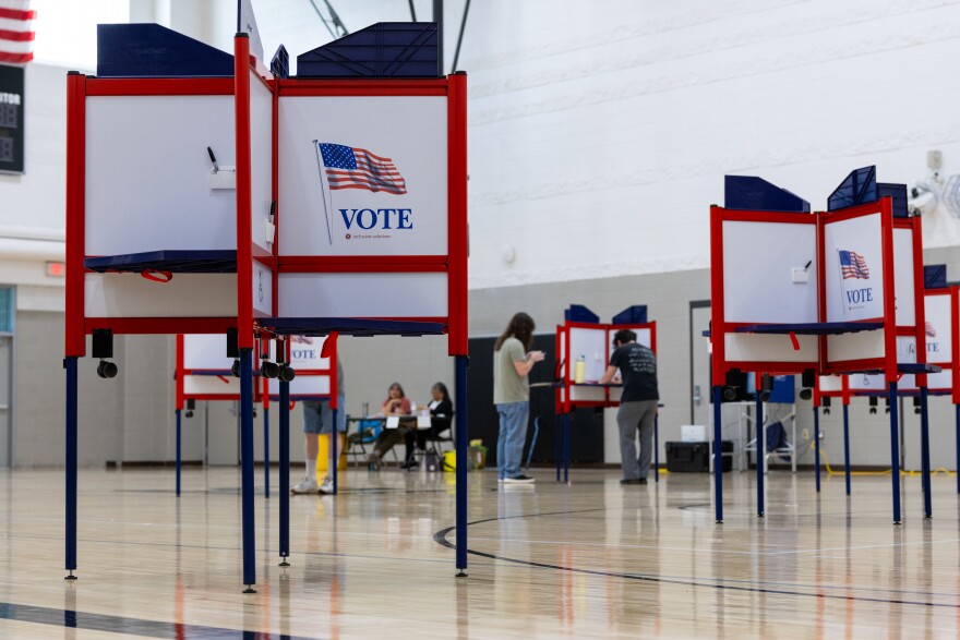 Voters cast their ballots for the August 4 primary election inside of Saginaw United high school.