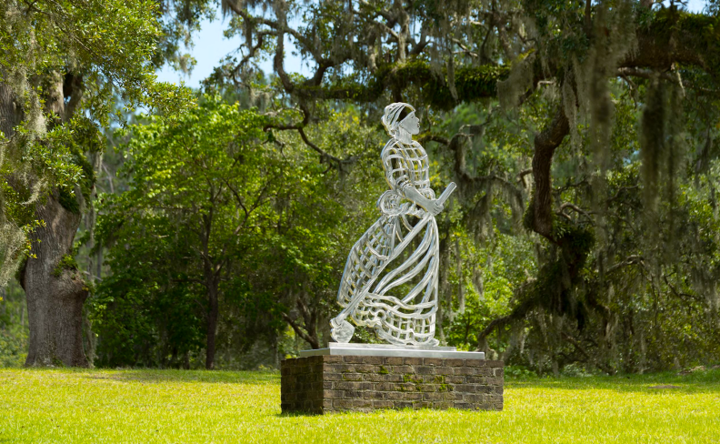 Sculpture of an enslave woman at Brookgreen Gardens, a vast complex of sculpture gardens, ecosystem trails, a wildlife preserve and a small zoo on four former rice plantations in Murrells Inlet, South Carolina.