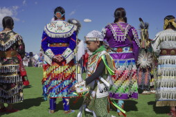 During the grand entry at the Snow Mountain Powwow by the Las Vegas Paiute Tribe, all the dancers enter the circle and line up while drummers sound off, on Saturday, Oct. 11, 2025.