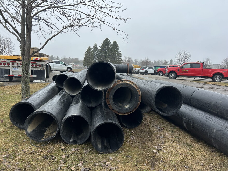 Stacks of large pipes near the Cheboygan Dam and Lock Complex on Wednesday, April 15, 2026.