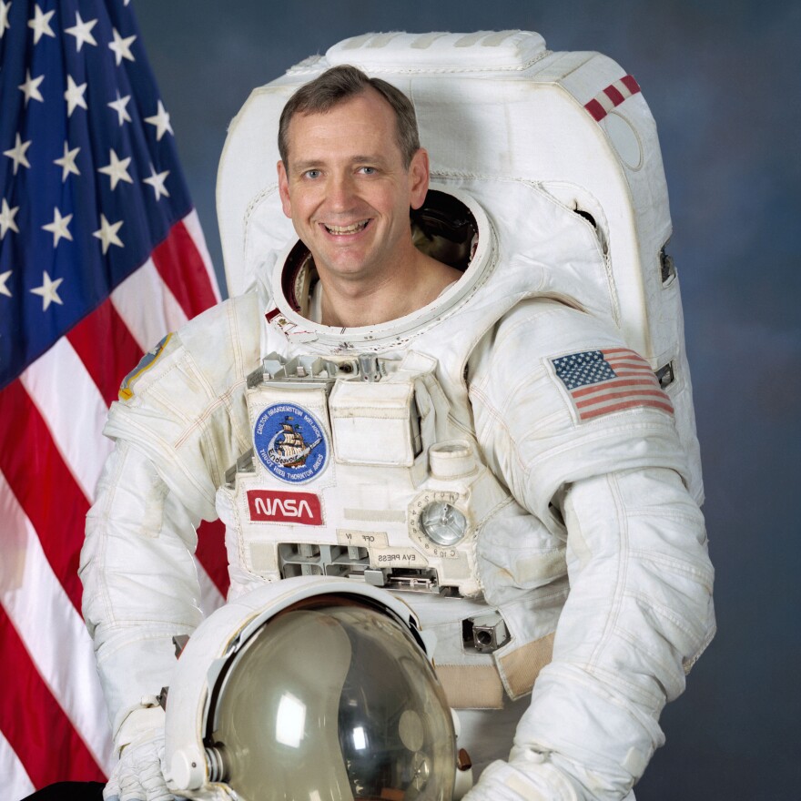 The official NASA portrait of Tom Akers