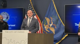 Fargo Police Captain Matt Christensen speaks to reporters.