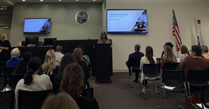 Judge Susan Miller-Jones talks with Coffee With the Court participants about why she created the event and where she got the inspirationg for it from. (Ethan Pettus/WUFT News)