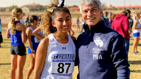 Mia and Carlos Sanchez pose during Mia's time on the St. Edwards University Cross Country team.