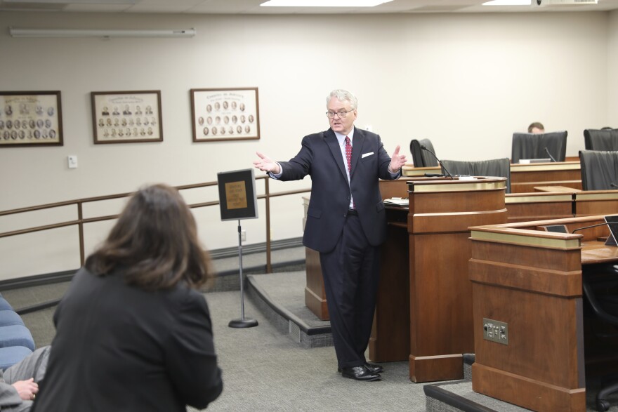 South Carolina Treasurer Curtis Loftis turns to his staff during a state Senate hearing into how $1.8 billion ended up in an account without anyone knowing where it came from or was supposed to go, Tuesday, April 2, 2024, in Columbia, SC. (AP Photo/Jeffrey Collins)