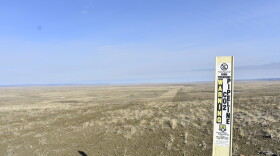 A narrow sign marks the location of a CO2 pipeline in Carter County Montana.