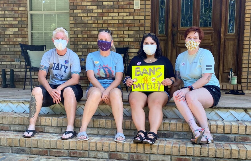 From left to right: Kate Kasten, Alison Smith, Carollyn Taylor and Heather Brescher. Brescher started the efforts to host a Women's March in Okaloosa.