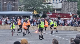 The flaming puck is dropped for unicycle "Flaming Puck Hockey" on Tuesday, July 23.