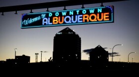 A neon sign welcomes visitors to Downtown Albuquerque.