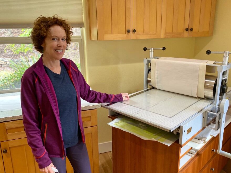 Tallmadge Doyle shows off her state-of-the-art press