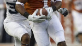 Longhorn Mike Davis on the run as the Texas Longhorns defeated Rice Saturday night 34-9. Photo courtesy of University of Texas at Austin athletics.