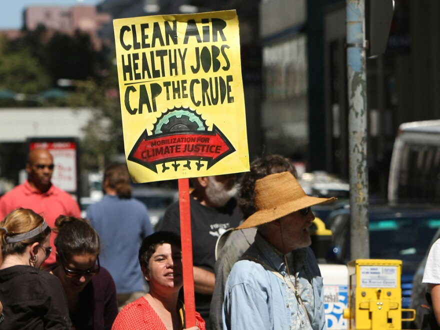 In California the group "Mobilization For Climate Justice" demonstrates for tougher measures to stop climate change. The group says new jobs will be created in a new green energy industry.