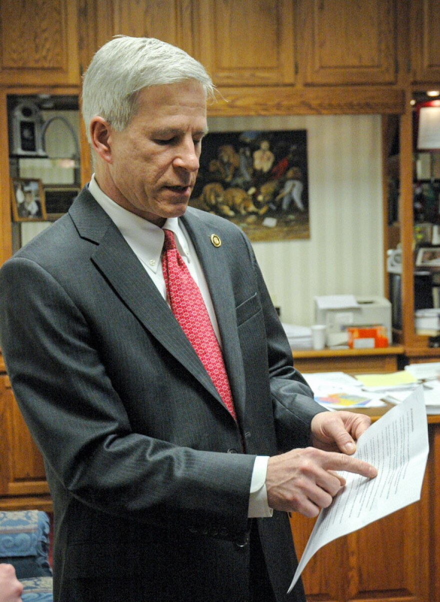 State Sen. Rob Schaaf points to evidence in support of his opposition to the database bill in his office at the Missouri State Capitol. He said the bill interfered with the right to medical privacy.