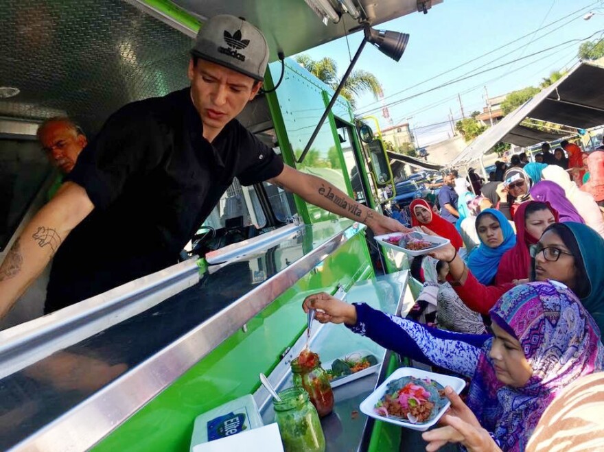 Muslims and Latinos line up for free halal tacos outside a mosque in Rosarito, in Baja California, Mexico, as part of the #TacoTrucksatEveryMosque Crosses the Border event, Sept. 1, 2017. The events seek to foster unity between two communities facing increasing discrimination.