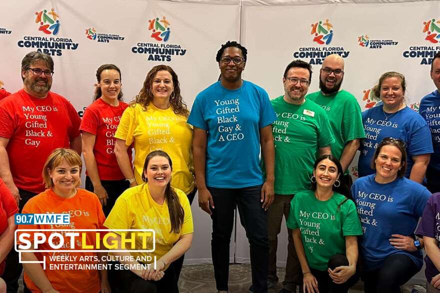 Central Florida Community Arts staff at a recent 12th anniversary event, wearing shirts they had made for their march in 2022 Orlando's Come Out With Pride parade. New CEO Terrance Hunter is center.