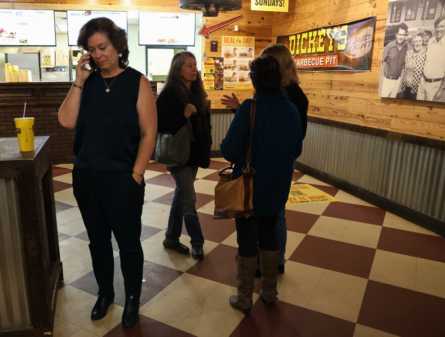 Tanya Heath calls opponent Barbara Buffaloe to congratulate her during the Mayoral race at her election watch party on Tuesday, April 8, 2025, at Dickey’s Barbecue Pit in Columbia.