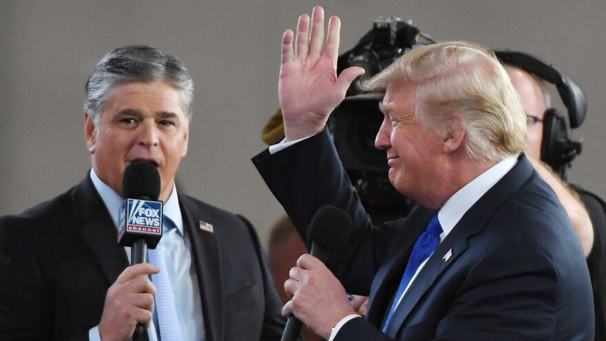 Fox News Channel and radio talk show host Sean Hannity interviews President Trump in Las Vegas in 2018. Hannity, like Trump, has cast doubt on the 2020 election results without providing evidence.