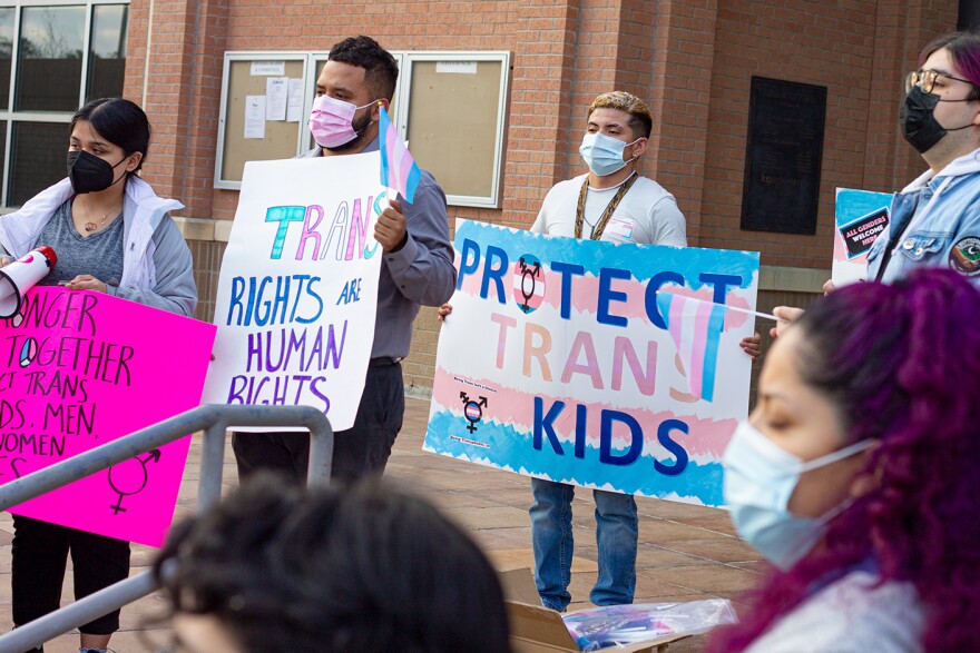 Trans rights advocates gather at Edinburg City Hall in The Rio Grande Valley in March to protest Gov. Abbott’s directive to investigate gender-affirming care as child abuse.