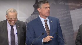 U.S. Sen. Martin Heinrich speaks in Washington D.C. about threats of a federal funding freeze, as Senate minority leader Chuck Schumer listens, Jan. 29, 2025.