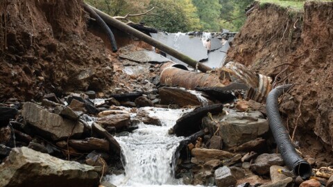 A ravine cuts through a road in Boone 