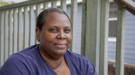 Dora Whitfield poses for a portrait outside of her home in New Orleans, Friday, July 2, 2021. After about a year of living on unemployment and other assistance, Whitfield faces the difficult decision of either waiting to return to her job at Harrah’s Casino with the possible removal of tipped pay or seeking new employment.