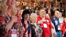Texas Republican Convention attendees stand for the Pledge of Allegiance in Fort Worth.
