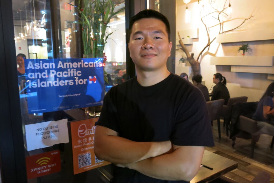 Xu Lin co-owns Bubblefish, a restaurant in Philadelphia's Chinatown neighborhood. His support for Hillary Clinton is based more on his dislike of Donald Trump, whom he labels as a "racist, xenophobic, homophobic, sexist" person.