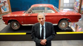 Consumer advocate Ralph Nader poses in front of a Chevrolet Corvair in the American Museum of Tort Law in Winsted, Conn. Nader featured the Corvair in his 1965 book on the auto industry's safety record, <em>Unsafe At Any Speed</em>.