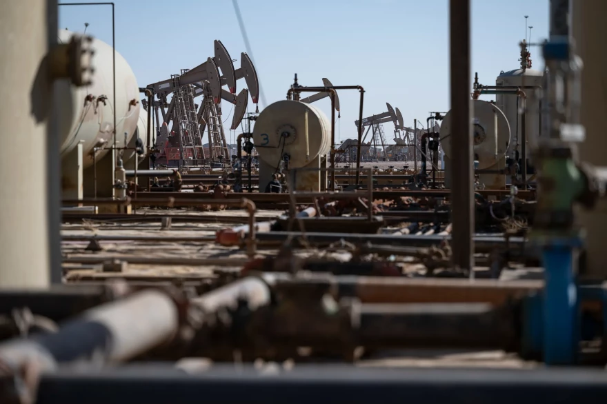 An array of jacks operate at a well site on March 18, 2025, in Midland.