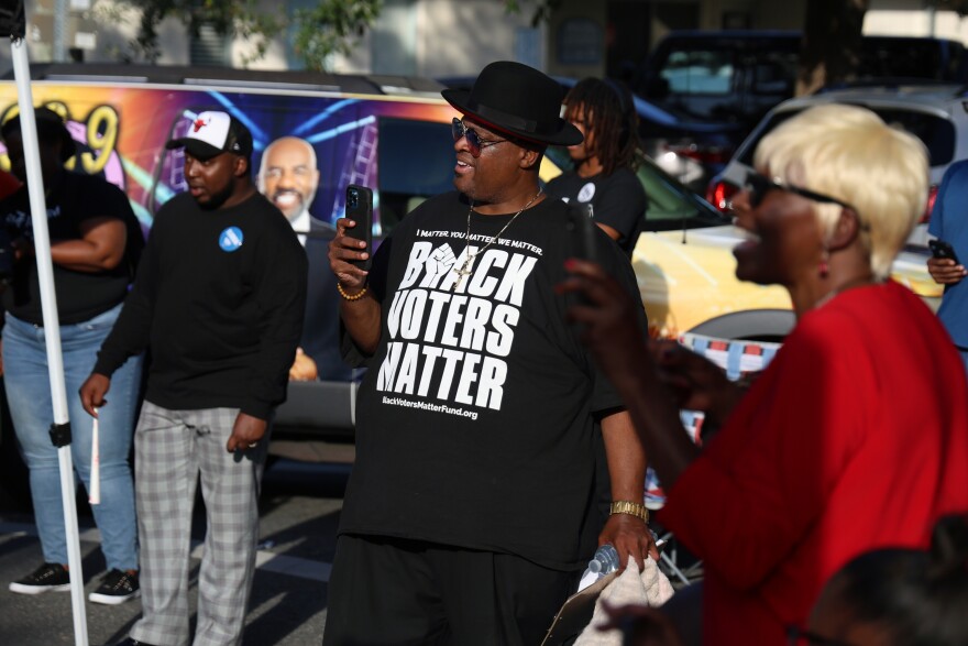 Rev. Karl Anderson records a music performance at a Souls to the Polls and Empowerment Sunday event in Gainesville, Fla., Sunday, Nov. 3, 2024. Anderson is the Alachua county area representative for Black Voters Matter, a voting rights organization. (Diego Perdomo/Fresh Take Florida)