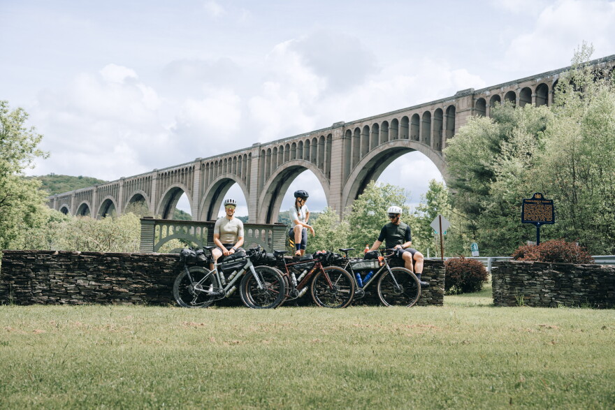 Gravel cyclists stop near the iconic Tunkhannock Viaduct in Wyoming County.