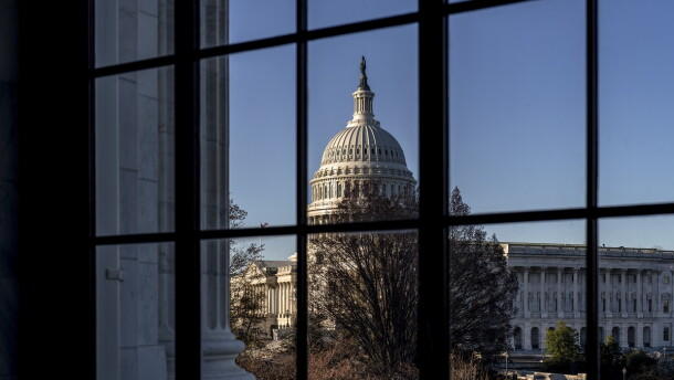 The Capitol is seen through a window in the Russell Senate Office Building, in Washington, Wednesday, March 15, 2023.